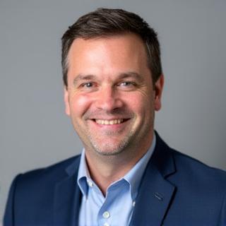 Portrait professionnel de Jean-Pierre Dubois.